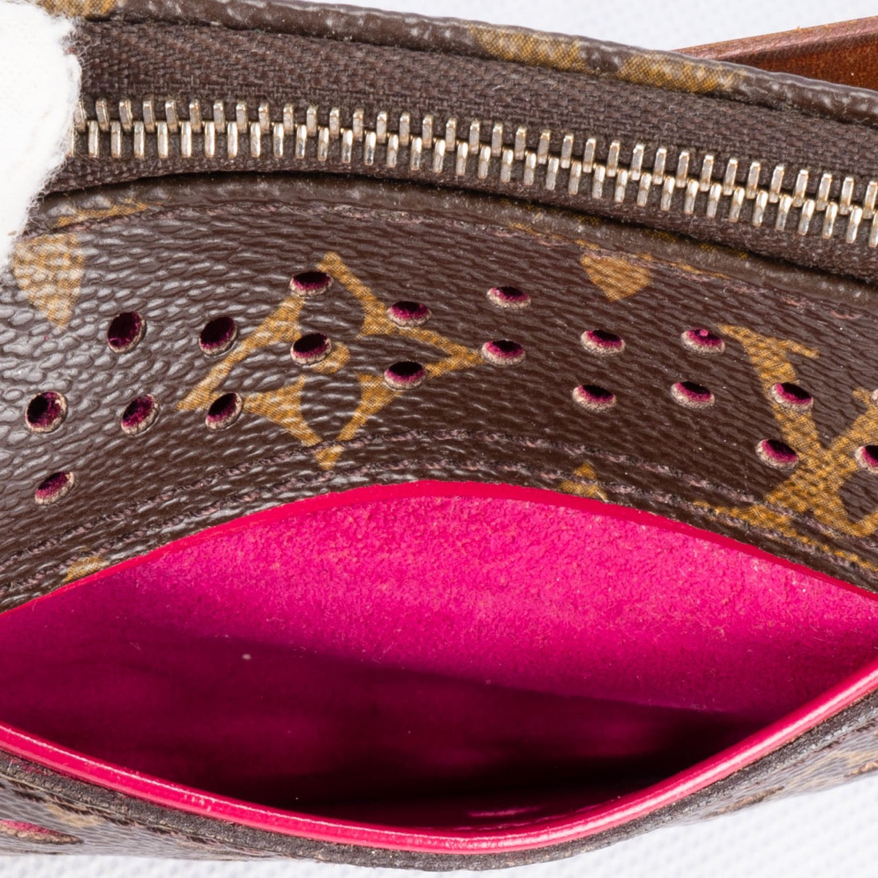 Louis Vuitton Perforated Canvas Monogram Pochette Bag
