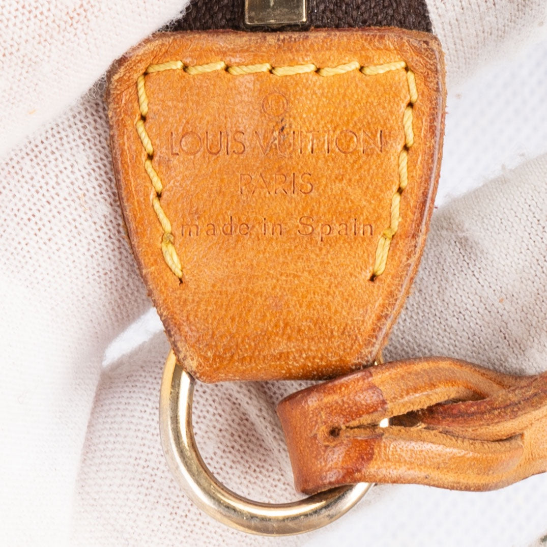 Louis Vuitton Perforated Canvas Monogram Pochette Bag