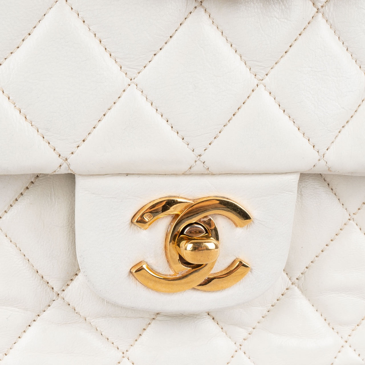 Chanel Quilted Lambskin 24K Double Flap Bag
