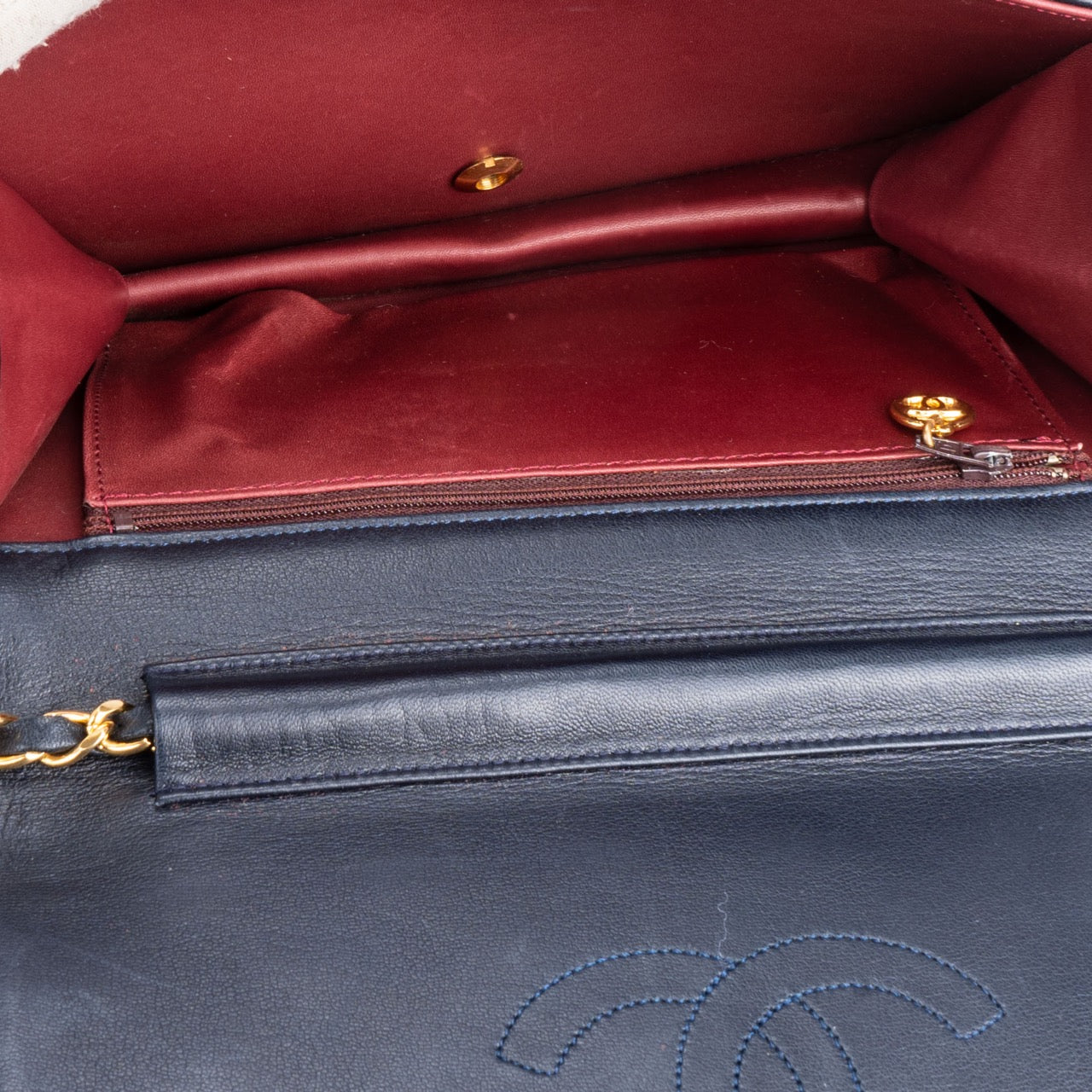 Chanel Quilted Navy Lambskin 24K Gold Single Flap Bag