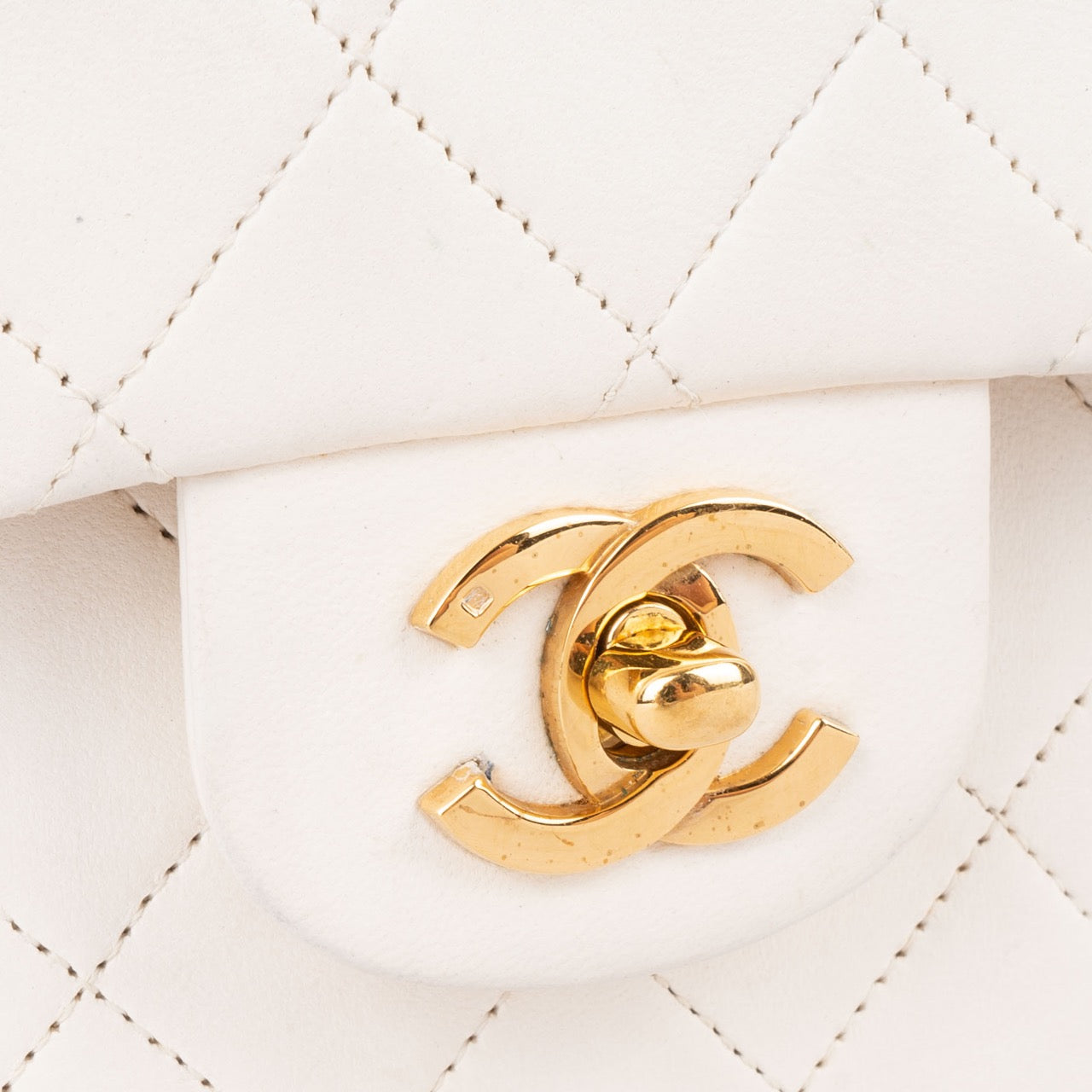 Chanel Quilted Lambskin 24K Gold Double Flap Bag