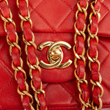 Chanel Quilted Lambskin 24K Gold Medium Double Flap Crossbody Bag