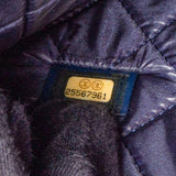 Chanel Grained Calfskin Studded O Clutch Bag