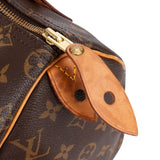 Louis Vuitton Monogram Canvas Speedy 25 Handbag