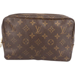 Louis Vuitton Canvas Monogram Trousse Toilette 23 Clutch - vintageandkickz