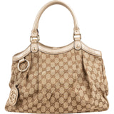 Gucci Monogram GG Canvas Metallic Leather Sukey Handbag