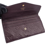 Louis Vuitton Monogram Empreinte Leather Curieuse Wallet