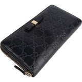 Gucci Guccissima Leather Bow Zip Around Wallet