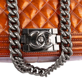 Chanel Quilted Patent Leather Medium Boy Crossbody Bag