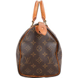 Louis Vuitton Monogram Canvas Speedy 25 Handbag