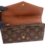 Louis Vuitton Monogram Canvas Sarah Wallet - vintageandkickz