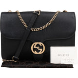 Gucci Grained Leather Interlocking GG Medium Crossbody Bag