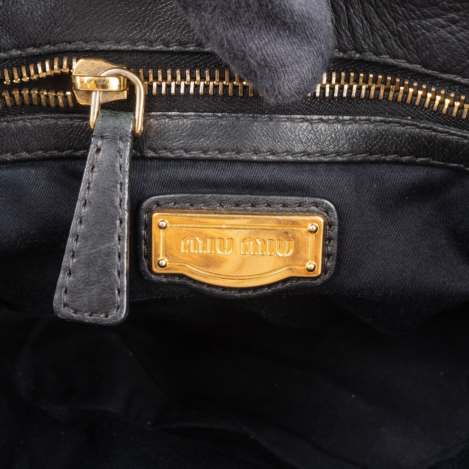 Miu Miu Quilted Leather Handbag - vintageandkickz