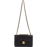Chanel Quilted Lambskin 24K Gold Maxi Single Flap Crossbody Bag