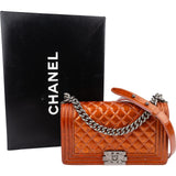 Chanel Quilted Patent Leather Medium Boy Crossbody Bag