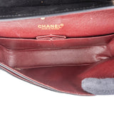 Chanel Quilted Lambskin 24K Gold Medium Double Flap Crossbody Bag