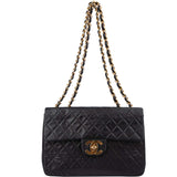Chanel Quilted Lambskin 24K Gold Maxi Single Flap Crossbody Bag