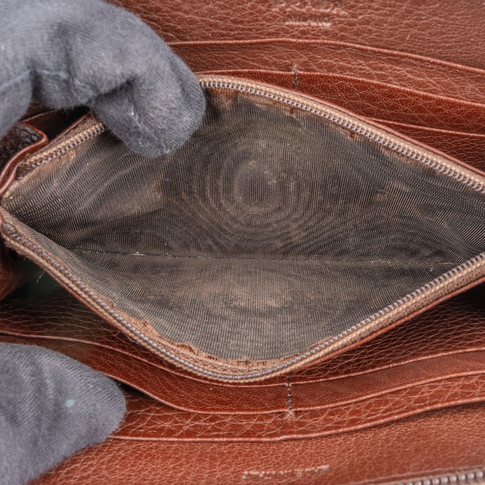 Prada Pebbled Leather Zip Around Wallet - vintageandkickz