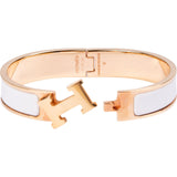 Hermès Gold Tone White Clic H Bracelet