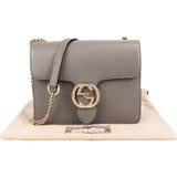 Gucci Pebbled Leather Small Interlocking GG Crossbody Bag