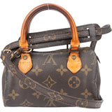 Louis Vuitton Canvas Monogram Mini Speedy Handbag
