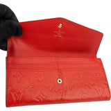 Louis Vuitton Leather Empreinte Monogram Curieuse Wallet