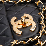 Chanel Quilted Lambskin 24K Gold Jumbo Single Flap Crosbody Bag