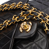 Chanel Quilted Lambskin 24K Gold Medium Double Flap Crossbody Bag