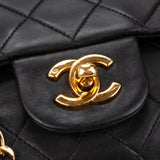 Chanel Quilted Lambskin 24K Gold Medium Double Flap Crossbody Bag