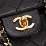 Chanel Quilted Lambskin 24K Gold Medium Double Flap Crossbody Bag