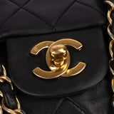 Chanel Quilted Lambskin 24K Gold Medium Double Flap Crossbody Bag