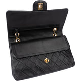 Chanel Quilted Lambskin 24K Gold Medium Double Flap Crossbody Bag