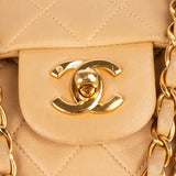 Chanel Quilted Lambskin 24K Gold Medium Double Flap Crossbody Bag