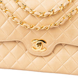 Chanel Quilted Lambskin 24K Gold Medium Double Flap Crossbody Bag