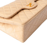 Chanel Quilted Lambskin 24K Gold Medium Double Flap Crossbody Bag