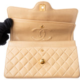 Chanel Quilted Lambskin 24K Gold Medium Double Flap Crossbody Bag