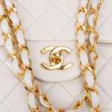 Chanel Quilted Lambskin 24K Gold Medium Double Flap Crossbody Bag