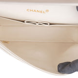 Chanel Quilted Lambskin 24K Gold Medium Double Flap Crossbody Bag