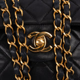 Chanel Quilted Lambskin 24K Gold Medium Double Flap Crossbody Bag