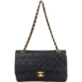 Chanel Quilted Lambskin 24K Gold Medium Double Flap Crossbody Bag