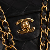 Chanel Quilted Lambskin 24K Gold Medium Double Flap Crossbody Bag