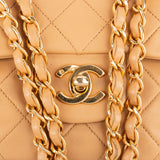 Chanel Quilted Lambskin 24K Gold Medium Double Flap Crossbody Bag