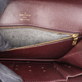 Louis Vuitton Taiga Leather Kourad Clutch