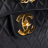 Chanel Quilted Lambskin 24K Gold Maxi Single Flap Crossbody Bag