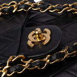 Chanel Quilted Lambskin 24K Gold Medium Double Flap Crossbody Bag