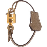 Hermès Taupe Togo Leather Clochette + Golden Padlock Schlos