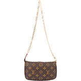 Louis Vuitton Canvas Monogram Mini Pochette Accessoire Handbag
