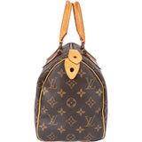 Louis Vuitton Canvas Monogram Speedy 25 Handbag