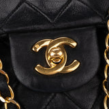 Chanel Quilted Lambskin 24K Gold Medium Double Flap Crossbody Bag