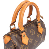 Louis Vuitton Canvas Monogram Mini Speedy Handbag